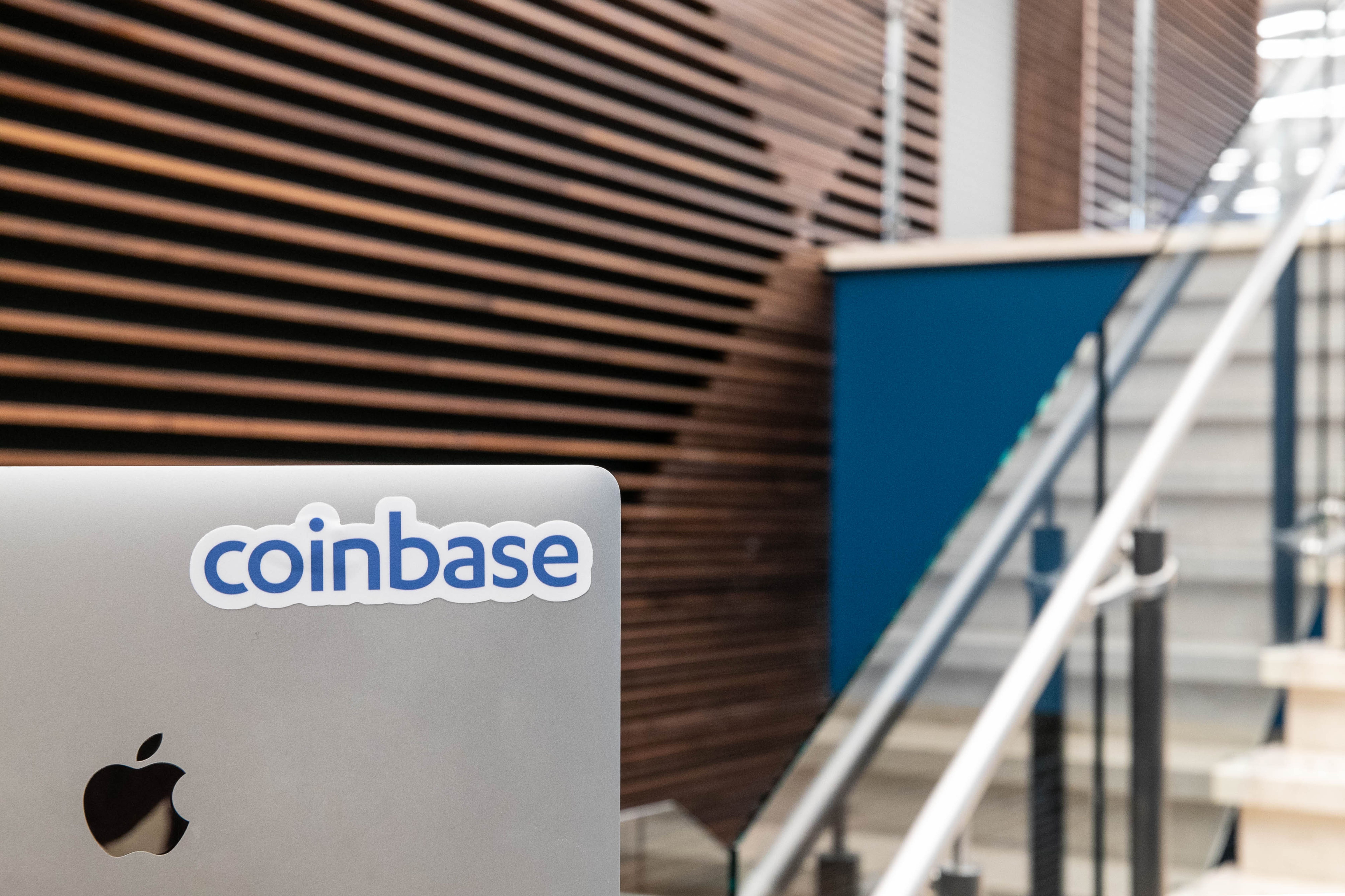 Cathie Wood Adds $14M In Coinbase As Stock Weathers Massive Crypto Crash