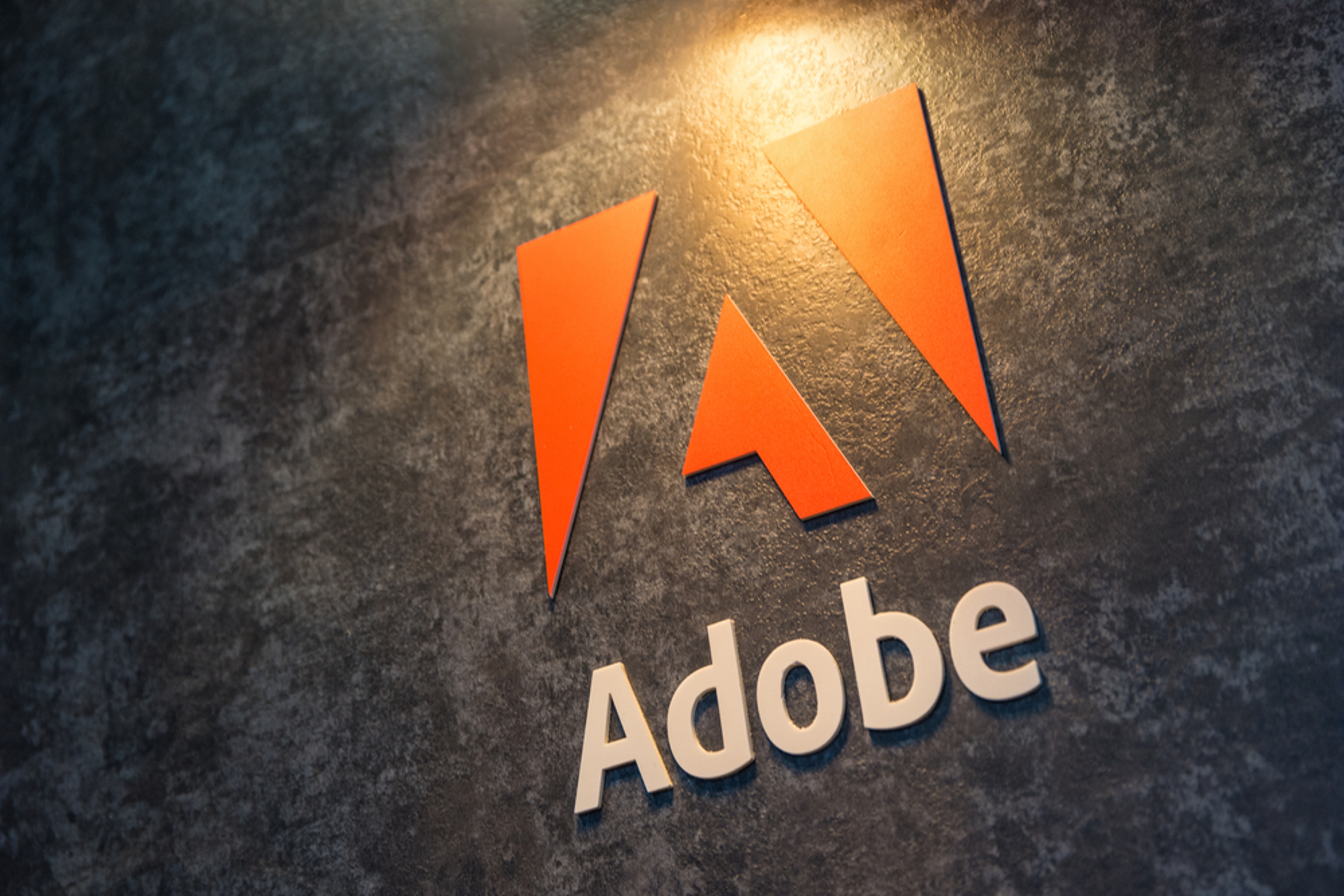 6 Adobe Analysts React To Q2 Earnings Beat, Guidance Cut, Heightened Execution Risks