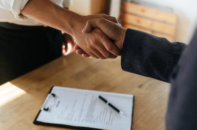 Partnership.,Two,Business,People,Shaking,Hand,After,Business,Signing,Contract