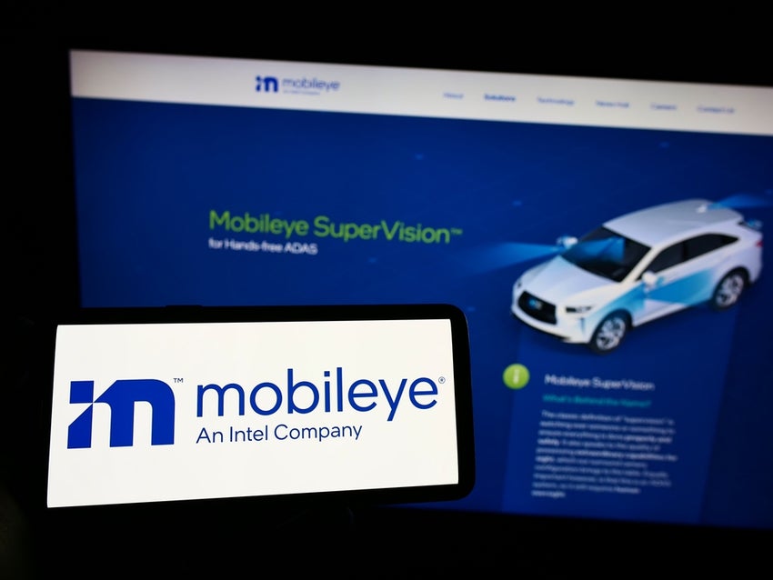 Person,Holding,Mobile,Phone,With,Logo