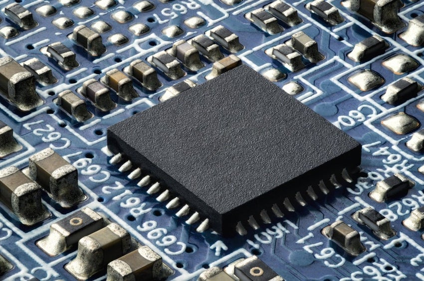 Small,Semiconductor,On,A,Circuit,Board.,Extreme,Closeup,Of,A