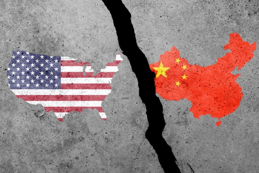 Usa,And,China,Flags,On,A,Concrete,Wall.,Usa,And