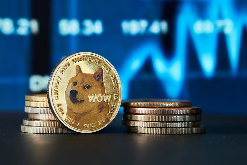 Closeup,Of,Golden,Dogecoin,Cryptocurrency,With,Graph,Background,In,Blue