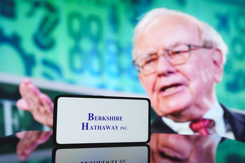 Berkshire,Hathaway,Company,And,Warren,Buffett,In,Background.,December,5,