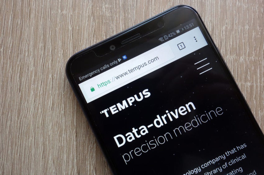 Tempus AI website displayed on phone screen