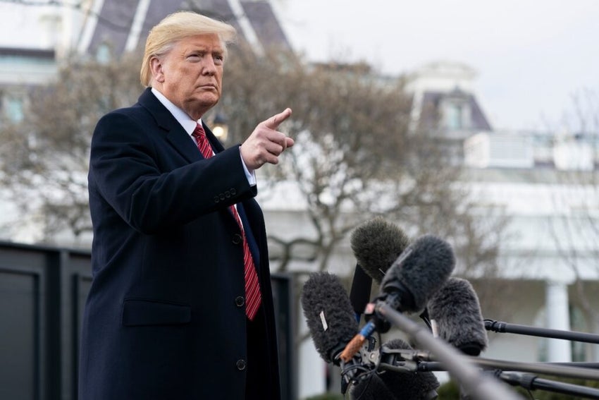 President Donald Trump speaks to reporters before boarding Marine One