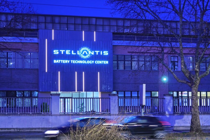 Stellantis logo displayed at the entrance of the Mirafiori factory in Turin, Italy.