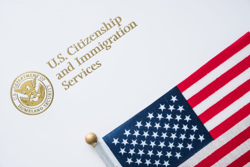 Envelope from U.S. Citizenship and Immigration Services featuring the American flag