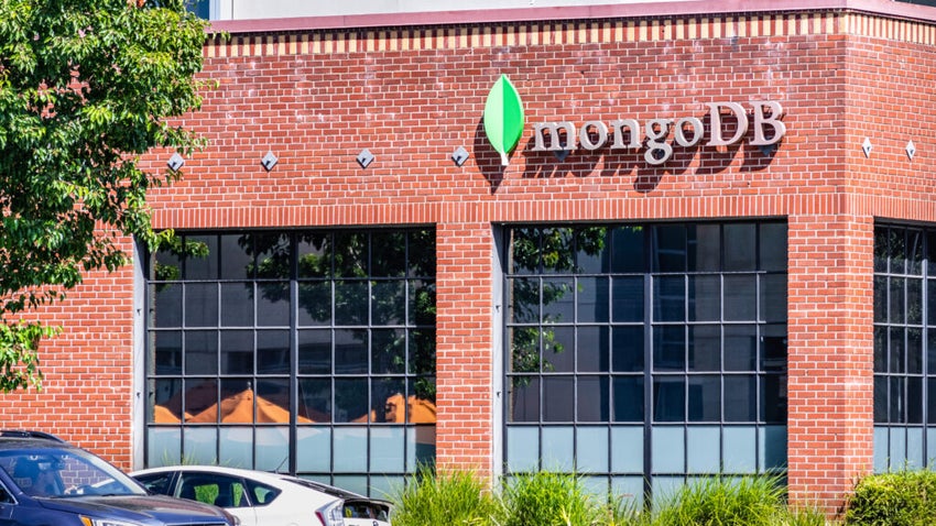 MongoDB sign on red brick building facade