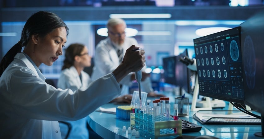 Research scientists working in lab