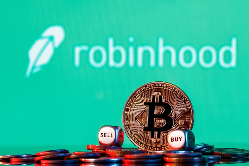 Robinhood logo in the background with Bitcoin in front