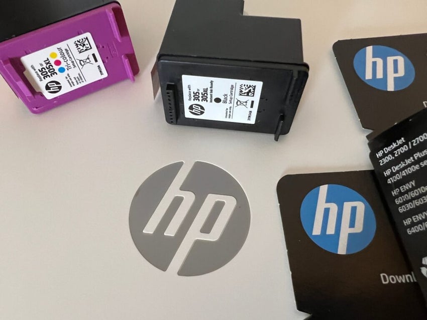 HP logo in the center surrounded by HP Ink Cartridges
