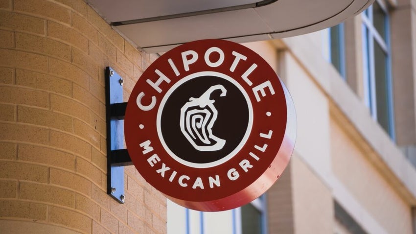 Chipotle Mexican Grill sign on brick wall