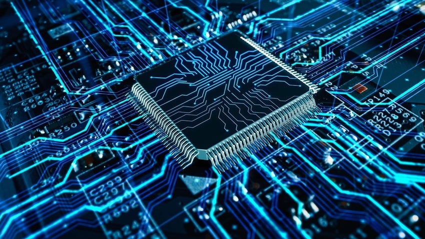 Microchip on blue circuit board with glowing lines
