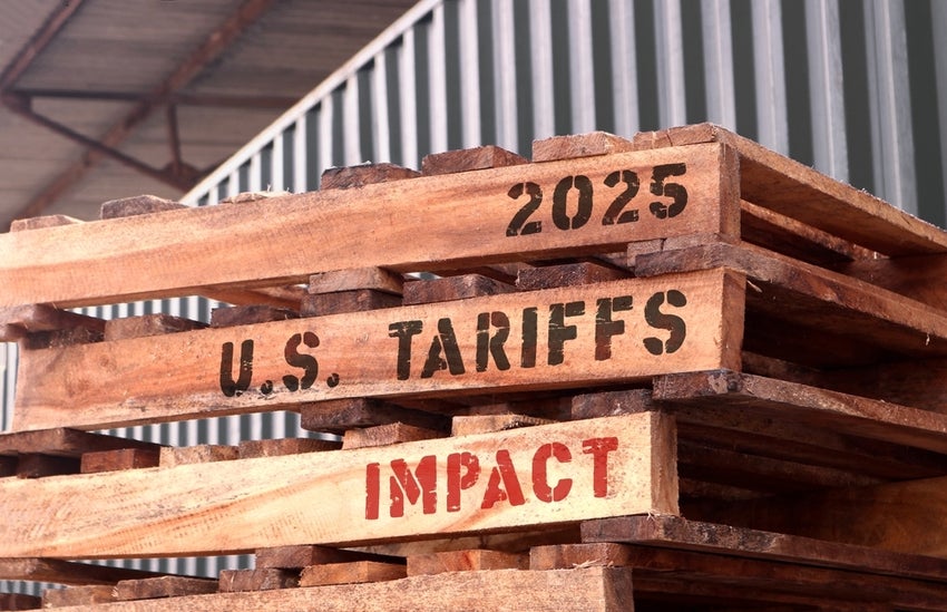 Trump tariffs' impact: text written on piled-up pallets