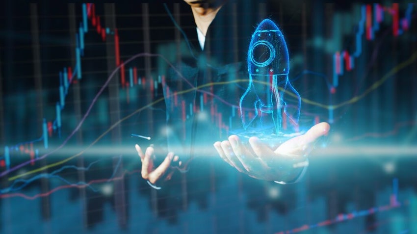 neon outline of a rocket and stock chart with man in the background