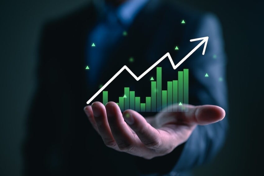 Businessman or trader is showing a growing virtual hologram stock, invest in trading. Height return.