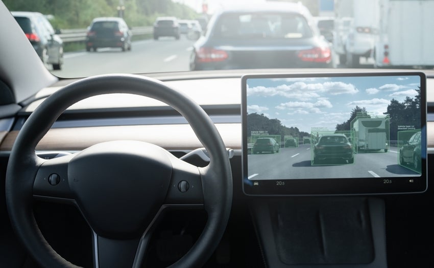 Inside view of self driving car on a road.