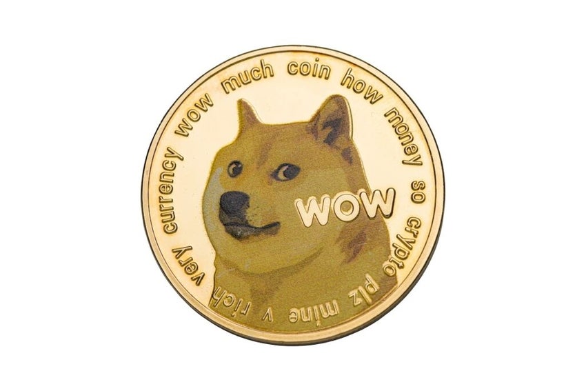 Dogecoin coin closeup isolated on white background
