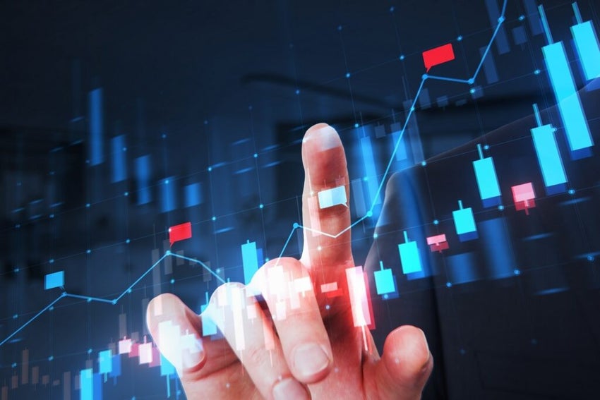 A person's hand interacting with a digital stock market chart on a dark blue background