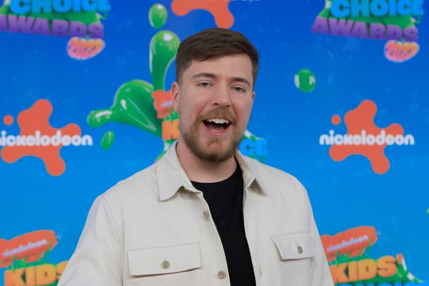 MrBeast against a colorful backdrop