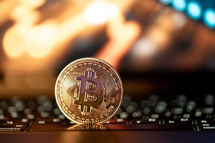 Bitcoin With Keyboard In Background