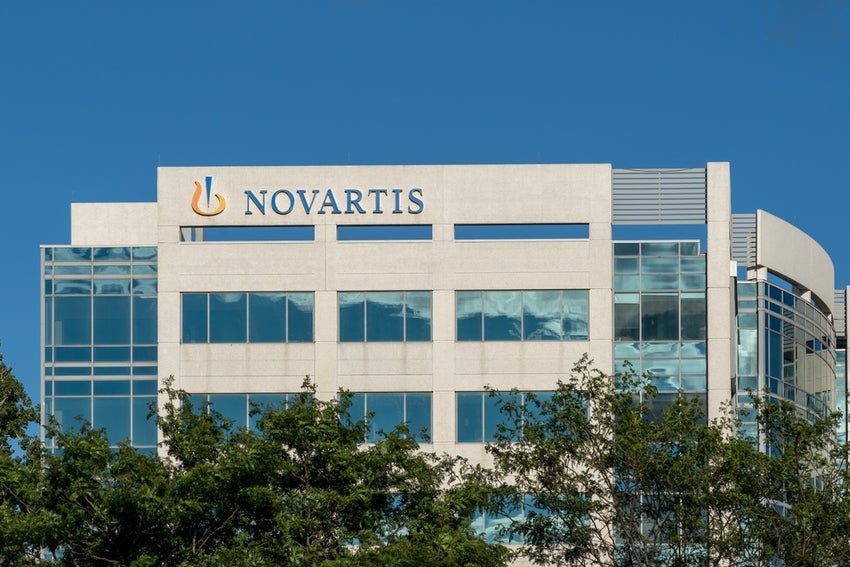 Novartis building with trees in foreground