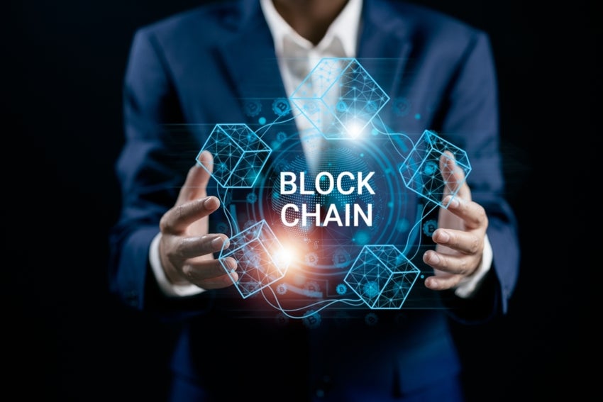 Businessman connecting to blockchain global networking, Token money bank bitcoin, cloud data network