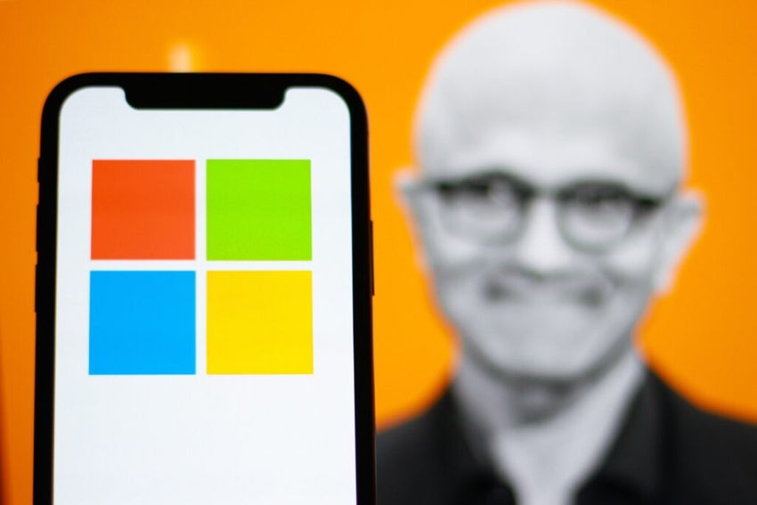 Representative Image of Satya Nadella with Microsoft logo