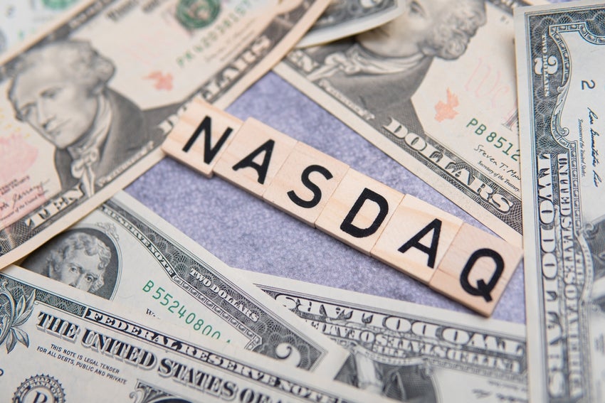 Nasdaq symbol with currency notes