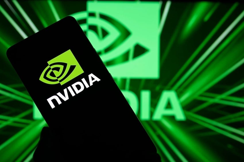 Smartphone with Nvidia log on it in front of a background with Nvidia log on it