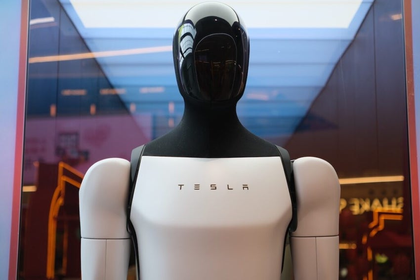 Tesla robot (Tesla bot) Optimus with brand logo