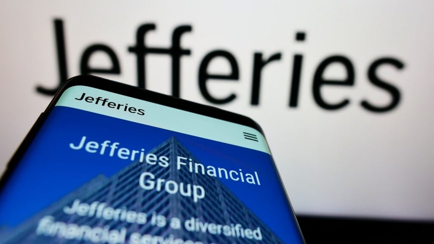 Stuttgart, Germany - 03-30-2022: Mobile phone with website of American company Jefferies Financial Group Inc on screen in front of logo. Focus on top-left of phone display. Unmodified photo.