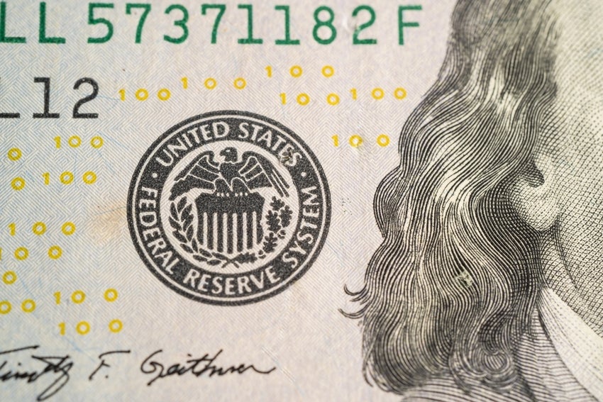 Hundred dollar bill with US Federal Reserve printed on it.