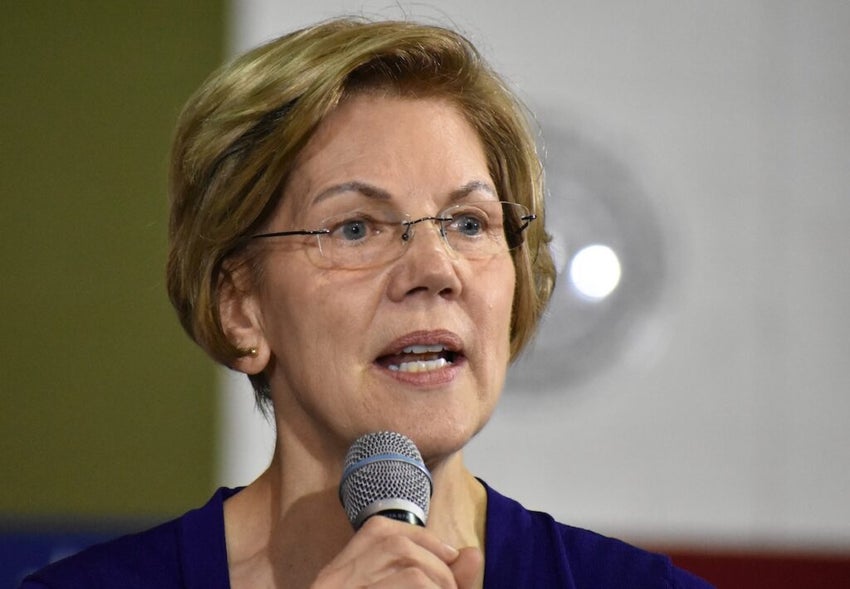 Elizabeth Warren speaks to a crowd of over 2,000 people in the gymnasium at Wakefield High School