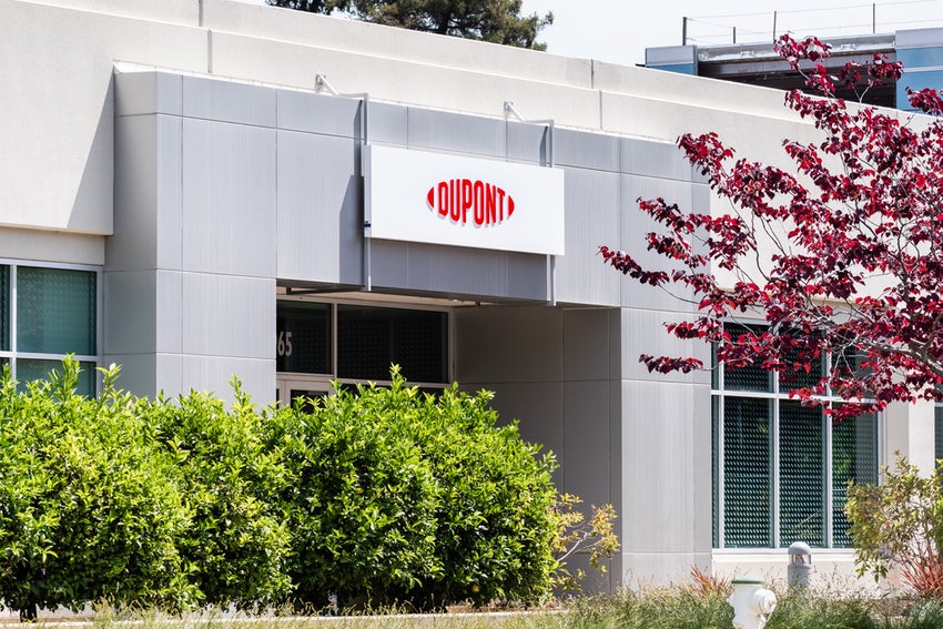 DuPont building entrance with logo and greenery
