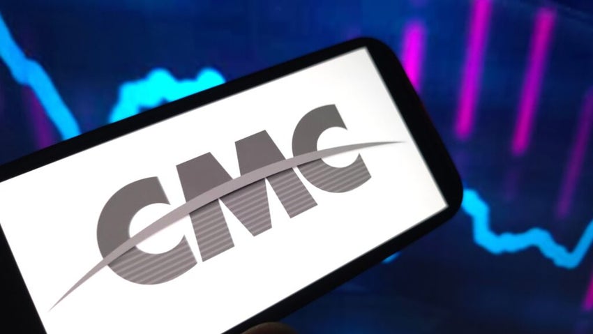 Commercial Metals Company logo displayed on mobile phone