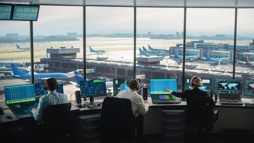 Diverse,Air,Traffic,Control,Team,Working,In,A,Modern,Airport