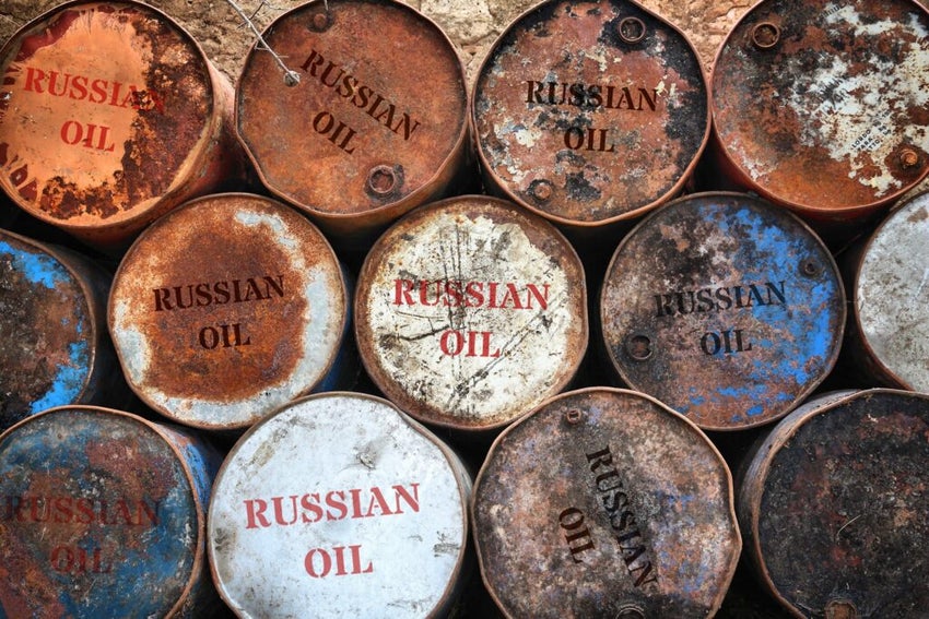 Russian oil in rusty oil barrels. Oil import from Russia.