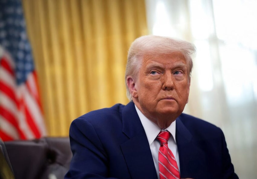 President Donald Trump sitting in the Oval Office