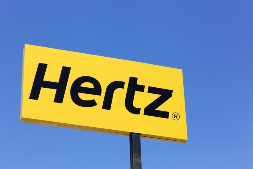 Hertz Sign with blue sky in background