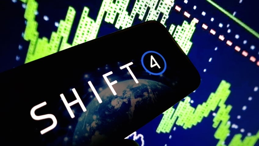 Shift4 Payments company logo displayed on mobile phone