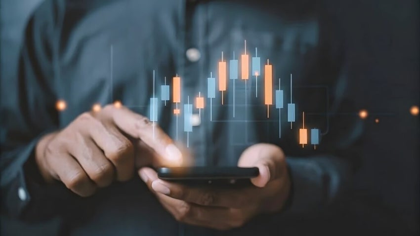 Businessman writing graph chart for analysis stock market price