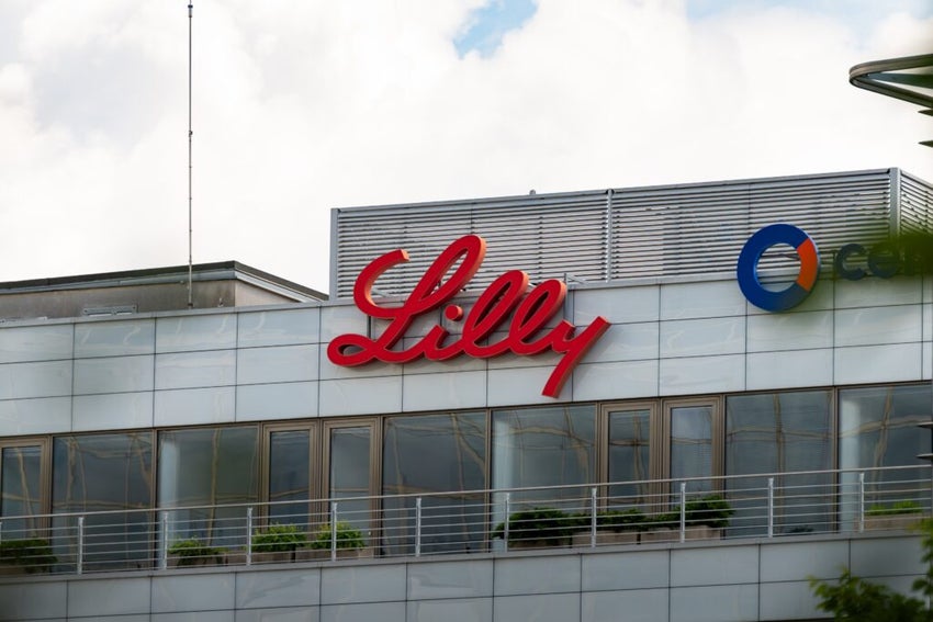 PRAGUE, CZECHIA - 30. May 2025: Eli Lilly logo sign of the pharmaceutical company. Close-up of the signage on an office building exterior in Europe. American drug development corporation.