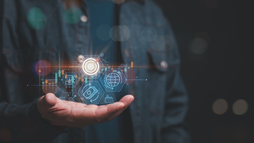 Person holds futuristic digital icons representing technology, finance, and global connectivity.