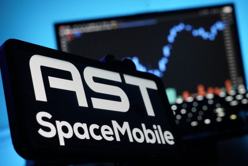 AST Spacemobile company logo on mobile device with stock chart in the background
