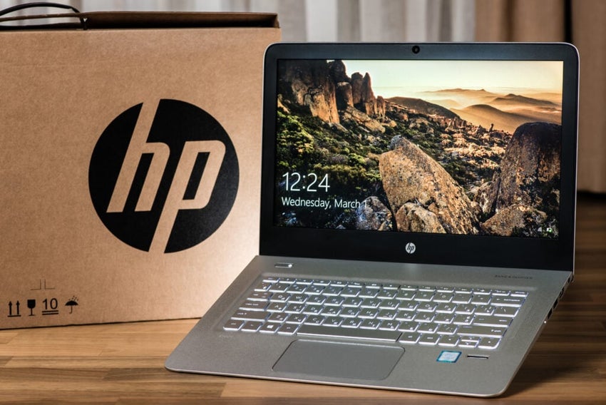 HP laptop next to an HP box