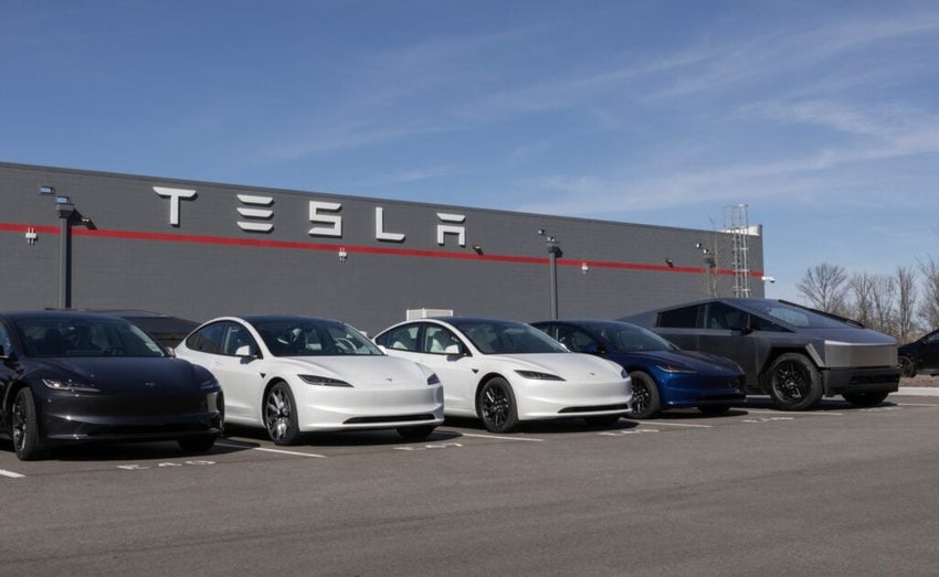 Indianapolis - February 28, 2025: Tesla EV electric vehicle Service Center. Tesla models include the Cybertruck, Model 3, Model Y, Model X and Model S.