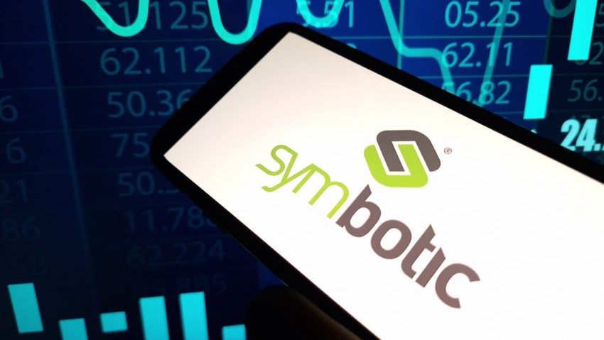 Symbotic Logo on phone with stock chart background